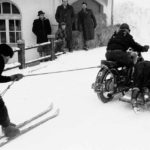 Vintage photo of skijoring skier pulled by motorbike with sidecar | Writer Mariecor | WriterMariecor.com