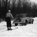 Vintage photo of Skijoring via automobile | Writer Mariecor | WriterMariecor.com